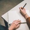 Person writing.
